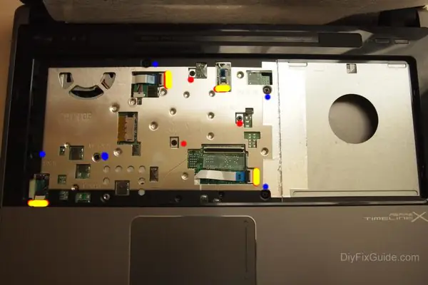 Remove the screws under the keyboard