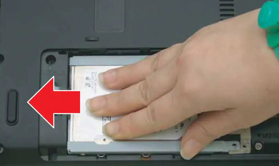 Slide the hard drive to the left