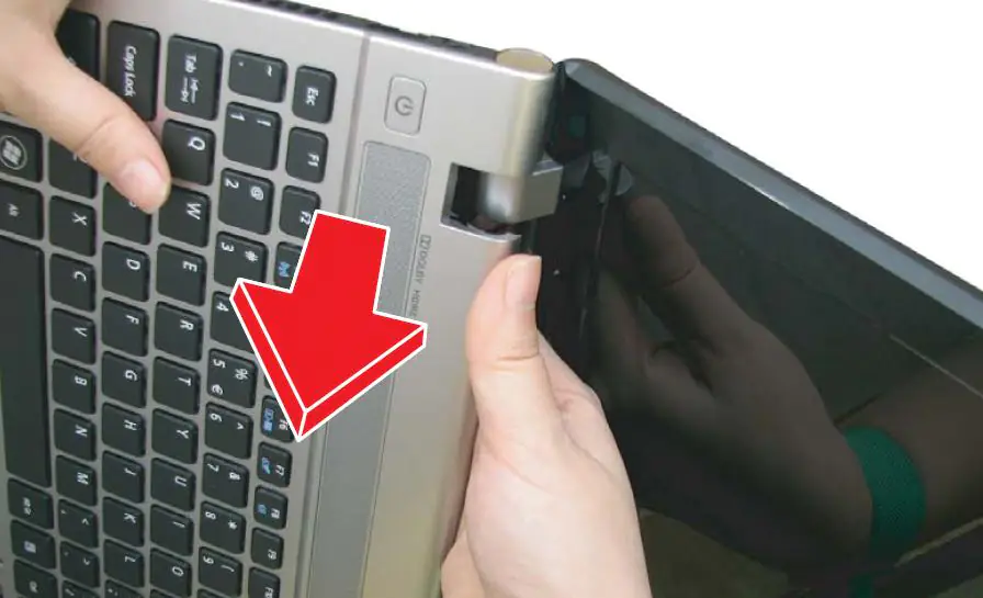 Remove the palm rest