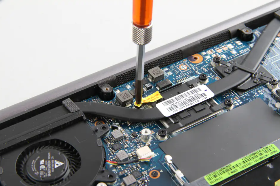 Remove the screws securing the heat sink
