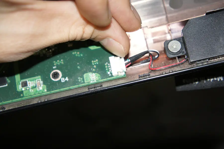 Unplug the speaker cable