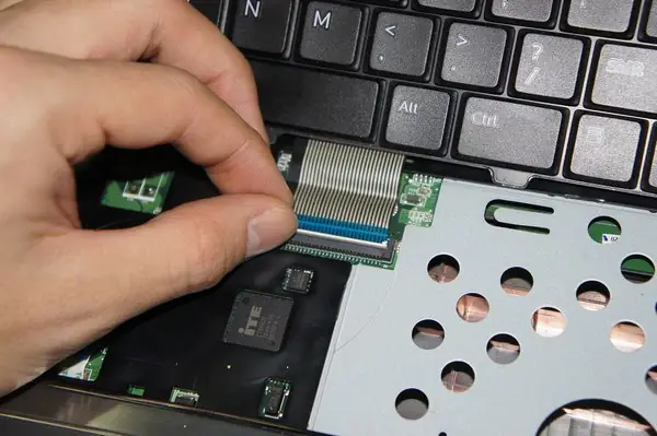 Pull out the keyboard cable