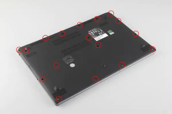 Remove all screws from the bottom cover