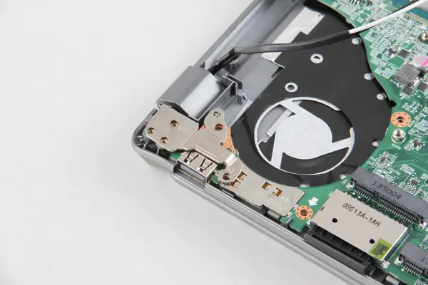Remove the screws securing the LCD hinges