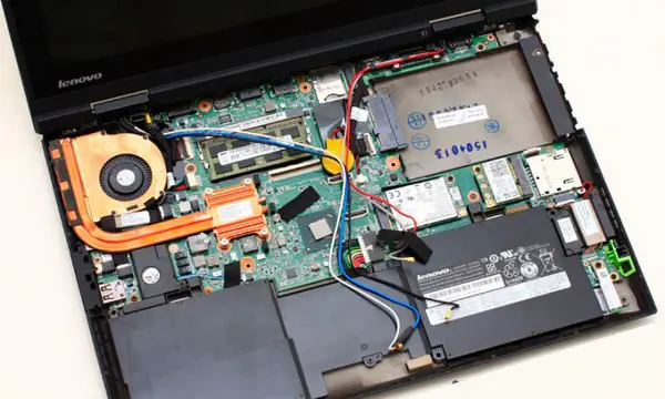 Close-up of the laptop after removing the palm rest