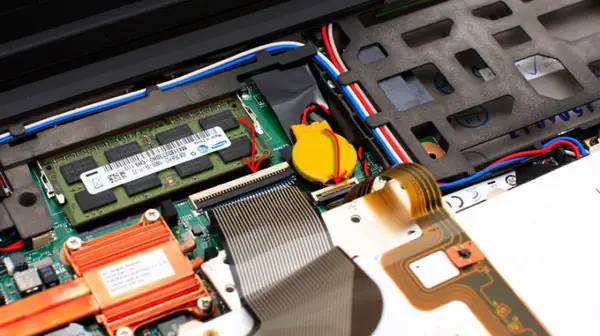 Disconnect the keyboard ribbon cable from the motherboard
