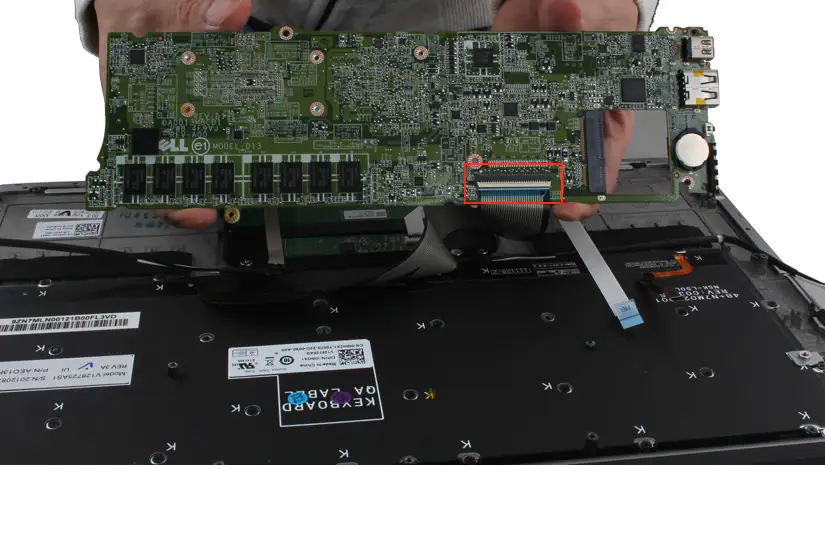 Disconnect the keyboard ribbon cable