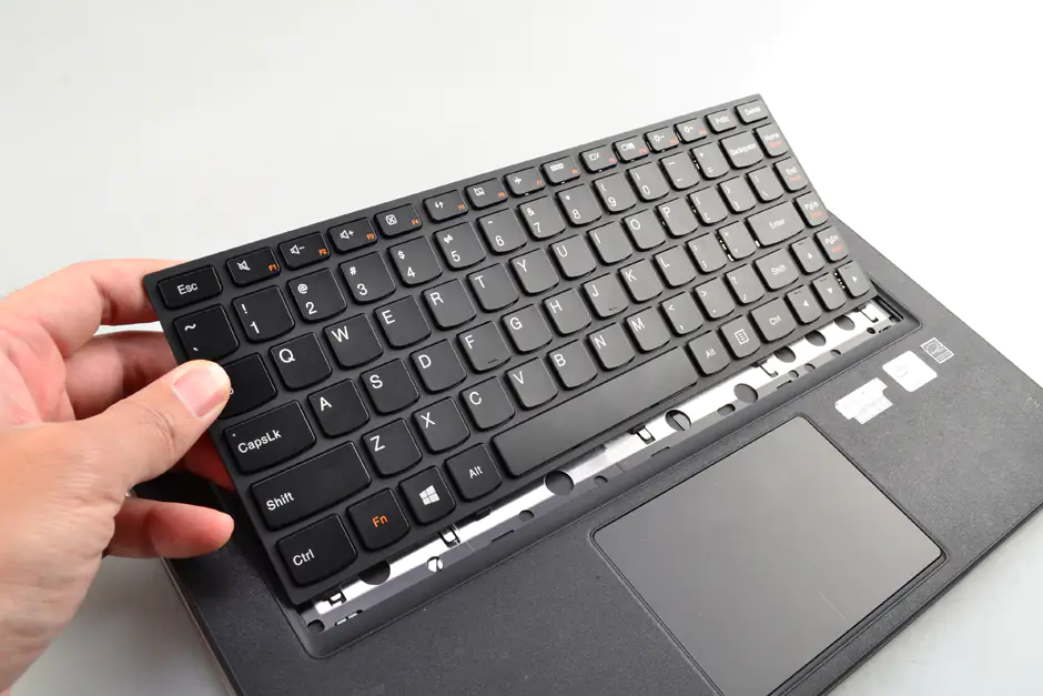 Place the keyboard on the palm rest