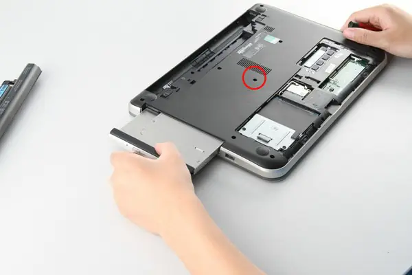 Pull out the DVD drive