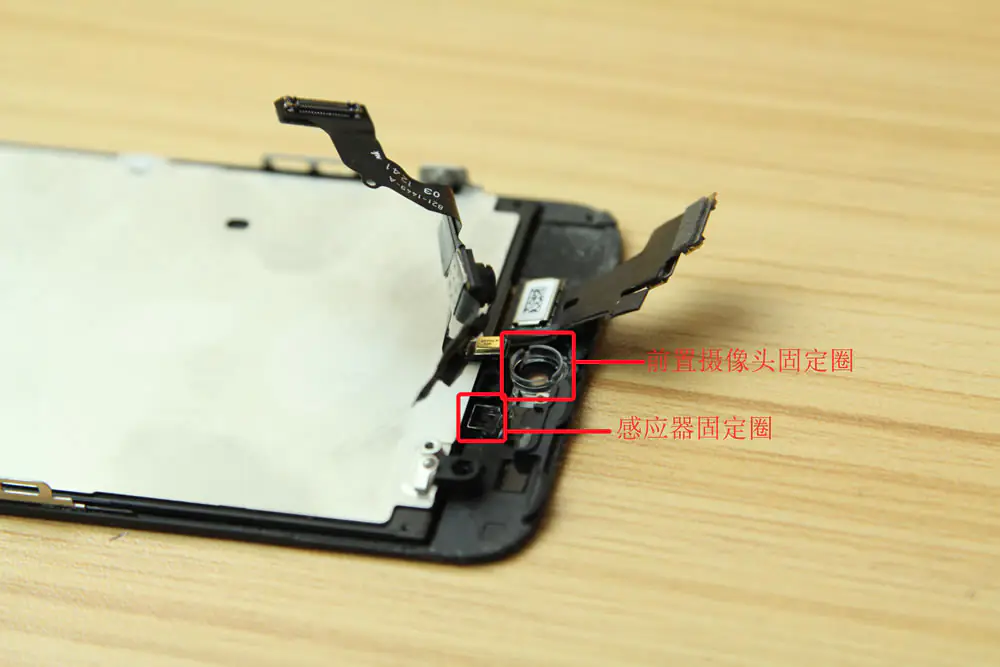Remove the camera and rear microphone assembly