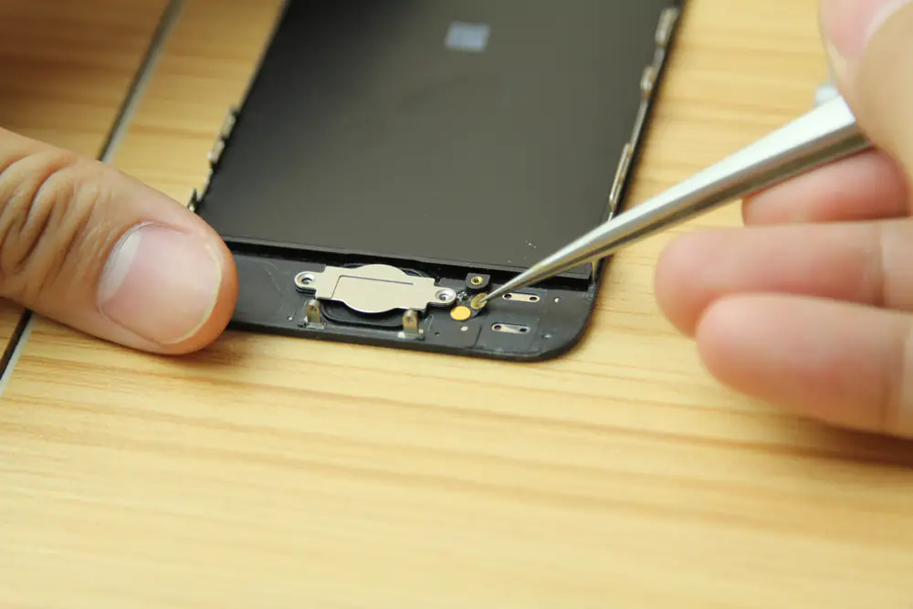 Remove the home button ribbon cable