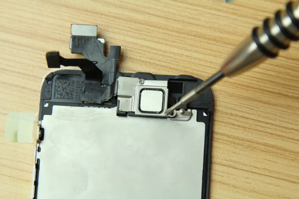 Tighten the two screws