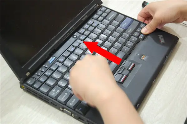 Slide the keyboard in the direction of the arrow