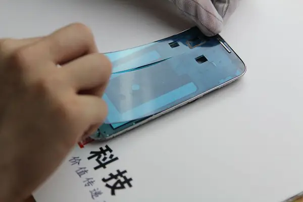Install the new double-sided adhesive film
