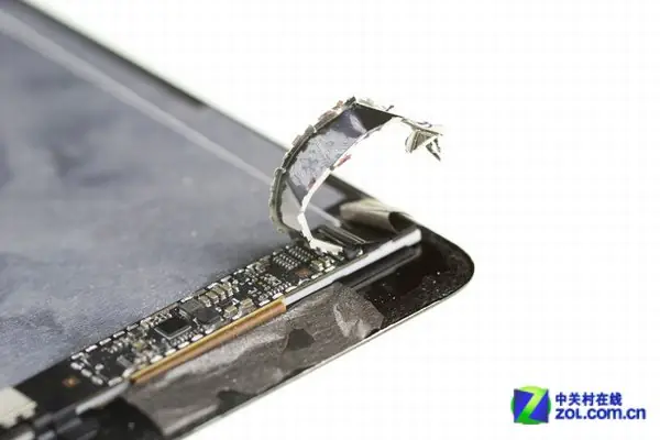 Remove the metal shield from the motherboard