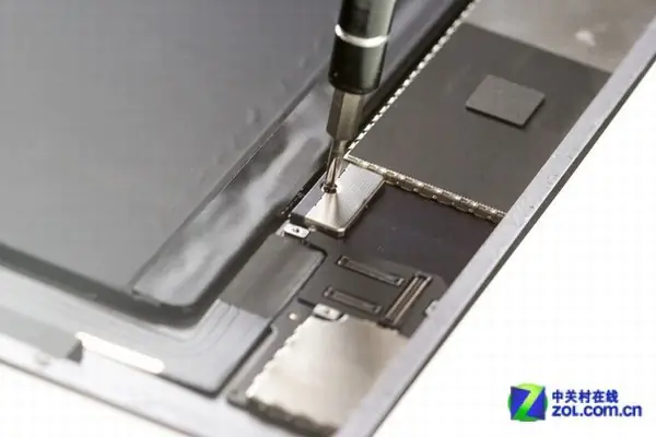 Remove the screws securing the metal shield