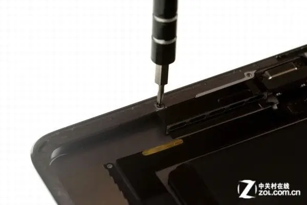 Remove the screws securing the speaker