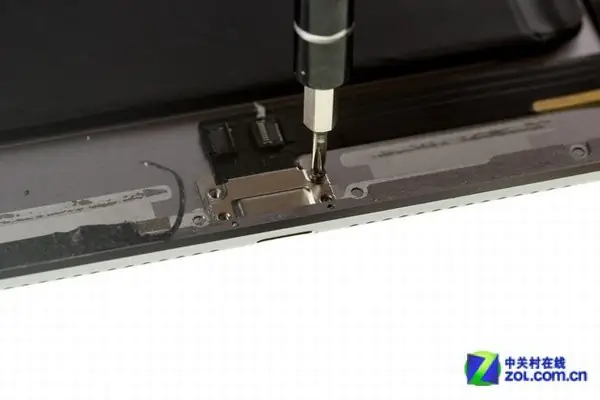 Remove the four screws securing the lighting port