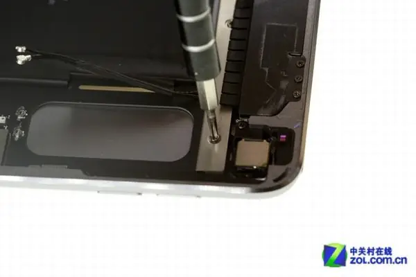 Remove the screws securing the metal plate