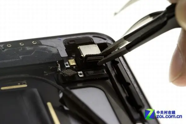 Disconnect the rear camera cable
