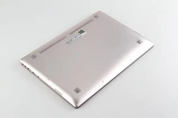 Remove all screws from the bottom cover