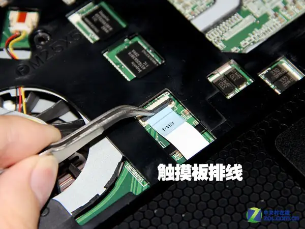 Disconnect the touchpad cable