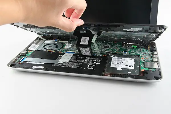 Remove the palm rest
