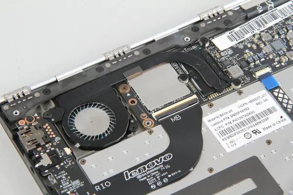 Remove the two screws securing the cooling fan