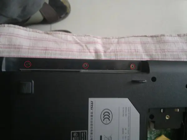 Remove the three screws