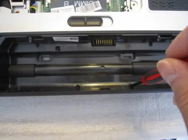 Remove the two screws in the battery bay