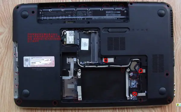 Remove all screws from the bottom cover
