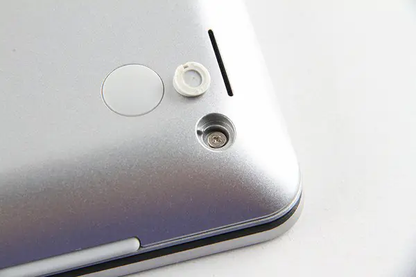 Remove all screws securing the bottom cover