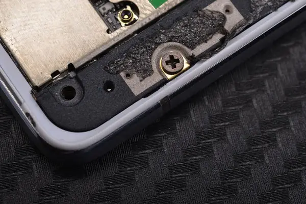 Remove the screws securing the protective cover