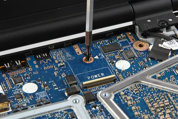 Remove all screws securing the motherboard