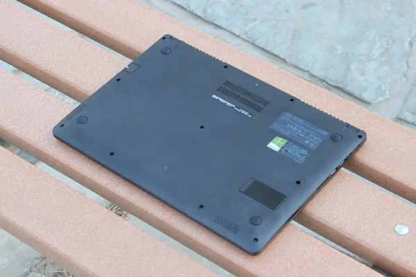 Remove the eleven screws from the bottom cover