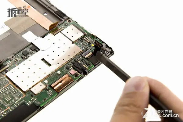 Disconnect the rear camera cable