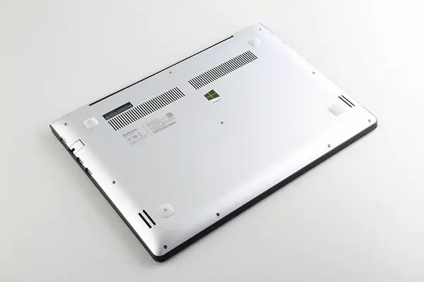Remove the eleven screws securing the bottom cover