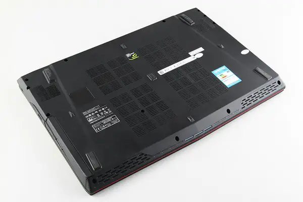 Remove all screws securing the bottom cover