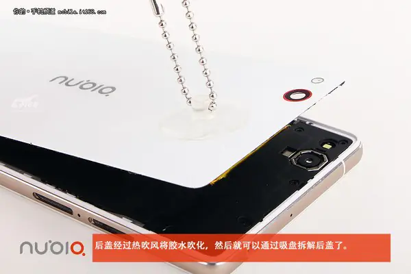 Open the back cover with a sucker