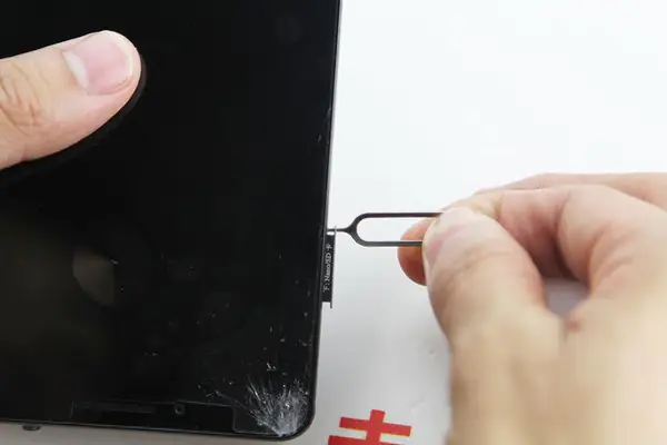 Remove the SIM card tray
