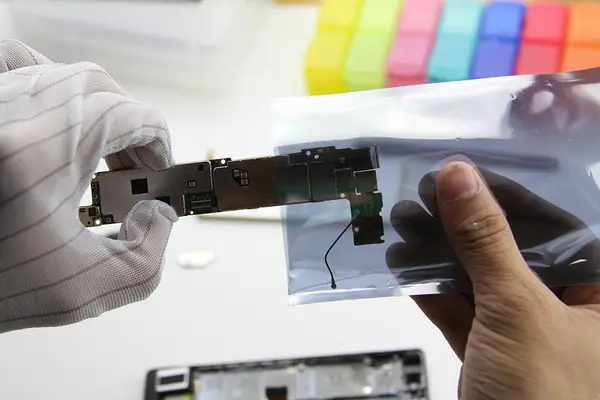 Put the motherboard into an antistatic bag