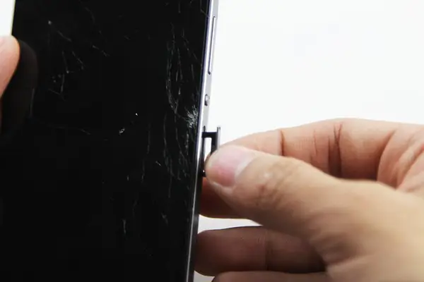 Remove the SIM card tray
