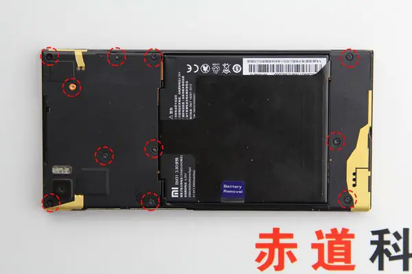 Remove the eleven screws securing the middle frame