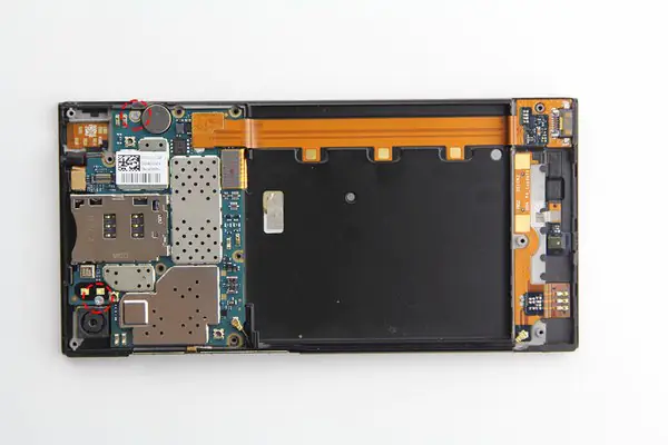 Remove the two screws securing the motherboard