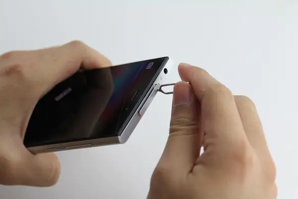 Remove the SIM card tray