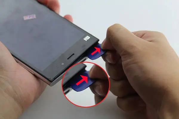 Carefully slide the pick