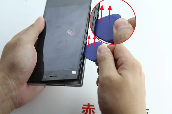 Carefully slide the pick