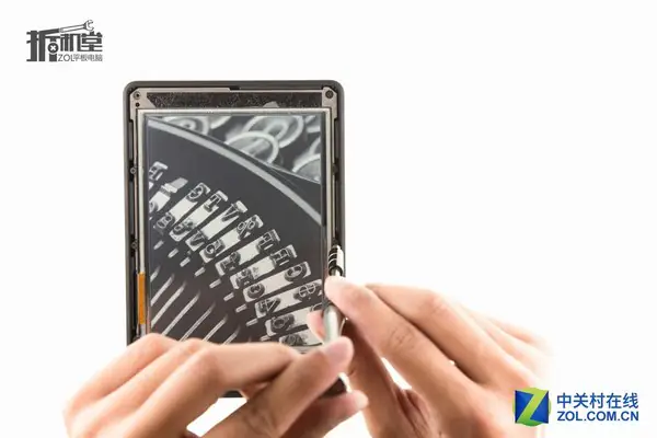 Remove all screws securing the display assembly