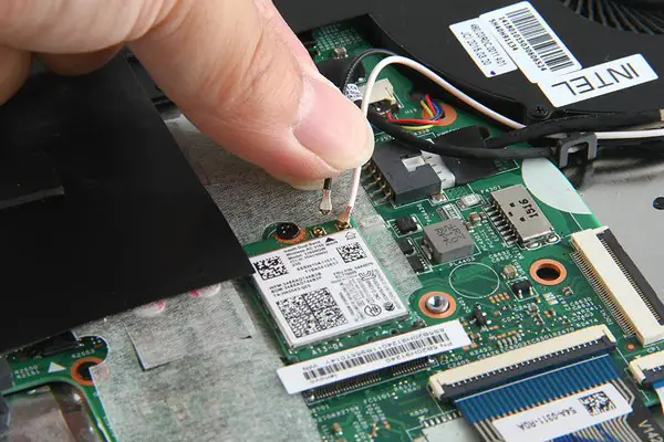 Disconnect the two wireless antenna cables