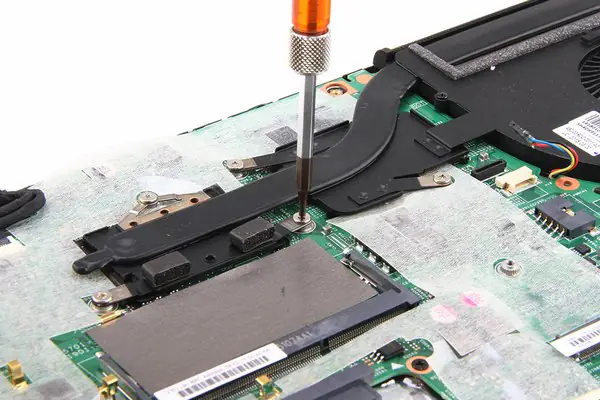 Remove the screws securing the heat sink